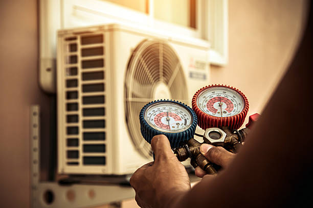 Professional Air Conditioning Service technician working in Rockport, IN
